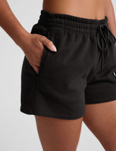 black women's fleece sweat shorts with pockets.